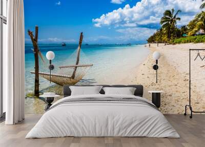 tropical beach with palm trees and hammock, the Morne, Mauritius  Wall mural