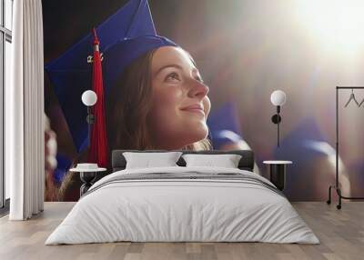 Joyful graduate celebrating achievement with cap, smiling in bright lights. Wall mural