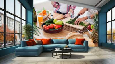 Gorgeous young Women preparing dinner in a kitchen concept cooking, culinary, healthy lifestyle Wall mural