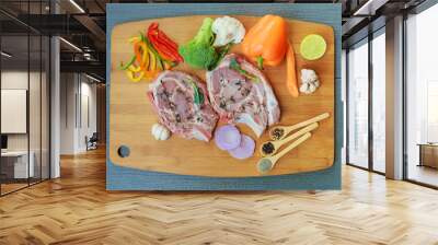 two pieces of raw pork on wooden cutting board ingredients Wall mural