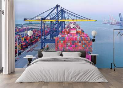 Modern Logistics,transportation of Container Cargo ship,Cargo plane,working crane bridge in shipyard. Distribution container terminal at dusk,international logistics, import-export business background Wall mural