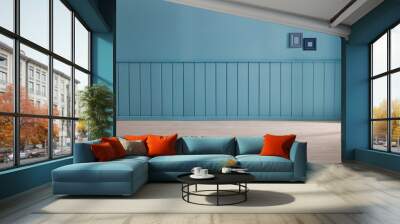 Blue wall, blue wooden background in the room style and frame picture decoration on the wall. Wall mural