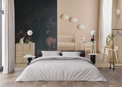 Decorative modern baby room with wooden crib bed and cabinet style. Wall mural