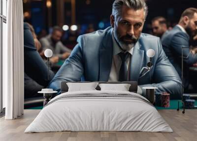 Portrait of a man sitting at a poker table in a casino Wall mural