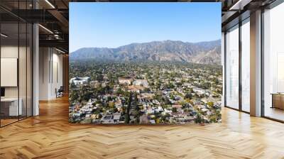 Aerial view above Pasadena neighborhood with mountain in the background. northeast of downtown Los Angeles, California, USA Wall mural