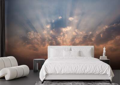 Sunset with clouds and light rays Wall mural