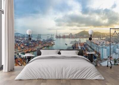 Panoramic aerial view of Hong Kong port industrial district, Stonecutters Bridge, and city on sunset skyline background. Logistic industry, Asia cityscape landscape, or transportation business concept Wall mural