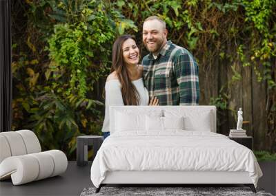 A young couple in their thirties is outdoors Wall mural