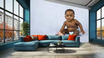 Sitting Up Adorable African American Baby Boy on a Grey Background Wall mural