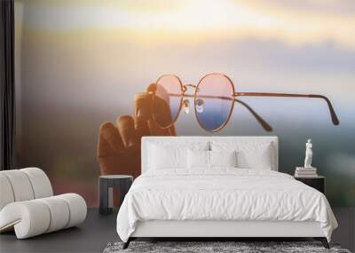 hand hold Hipster sunglasses  Wall mural