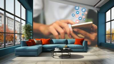 Young man using smart phone at home.Concept ,Social Distancing ,Working From Home Wall mural