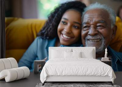 Happy black woman visiting her senior father in nursing home Wall mural