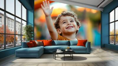 Little boy raising his hand Wall mural