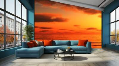 panoramic ocean sunset panorama of sunrise over the sea, the light in the clouds over the sea. Wall mural