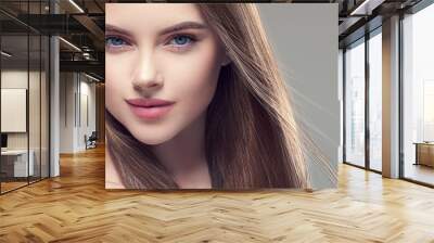 Beautiful brunette woman with long smooth hair beauty hairstyle female portrait Wall mural