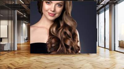 Beauty long hair woman curly hairstyle natural makeup Wall mural