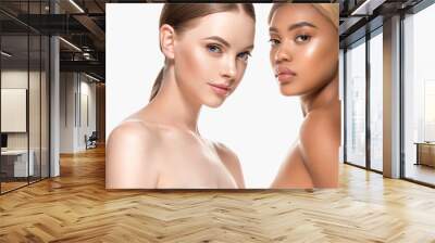 Different races woman beauty portrait isolated on white african girl and caucasian female Wall mural