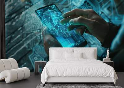 a man looks at a smart phone in his hand seriously and focused Wall mural