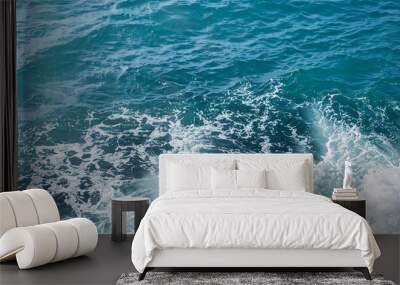 Background shot of aqua sea water surface with foam and copy space Wall mural