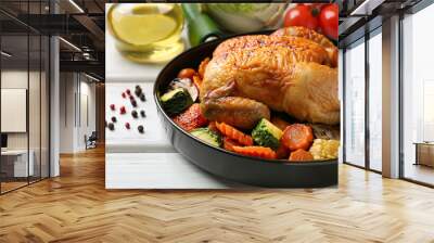 Delicious cooked chicken and vegetables on white wooden table, closeup. Healthy meals from air fryer Wall mural