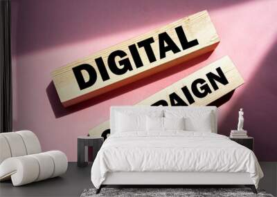 Digital Campaign written on a wooden blocks on pink. Online business advertising marketing concept Wall mural