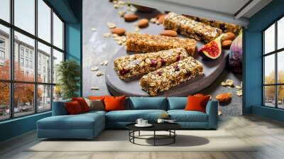 Homemade granola energy bars with figs, oatmeal, almond, dry cranberry, chia and sunflower seeds, healthy snack Wall mural