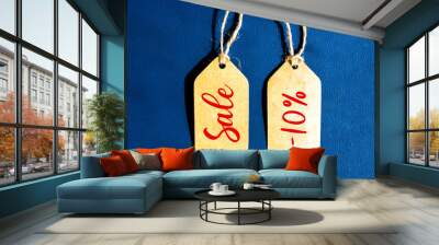 Sale Offer 10% off price tag with brown string on blue background Wall mural