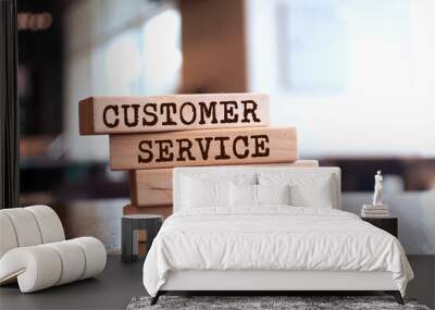 Wooden blocks with words 'Customer service pays off'. Business concept Wall mural