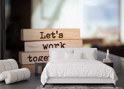 Wooden blocks with words 'Let's work together'. Business concept Wall mural