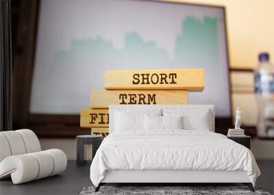 Wooden blocks with words 'Short Term Financial Investments'. Business concept Wall mural