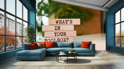 Wooden blocks with words 'What's In Your Toolbox?'. Wall mural