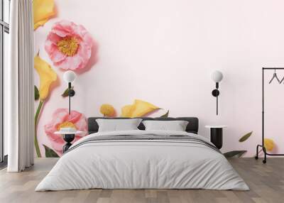 Flower layout in flat style on pastel pink backgro Wall mural