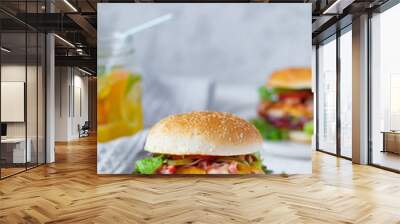 Homemade fresh chicken burger with bacon on gray plate on white background with lemonade, Fast food at summer time Wall mural