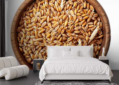 Wooden bowl with wheat grains isolated on white background with clipping path, top view Wall mural