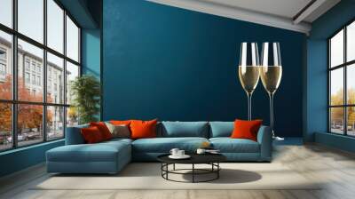 a minimalistic  sylvester blue background two champagne glasses, with empty copy space,  Wall mural