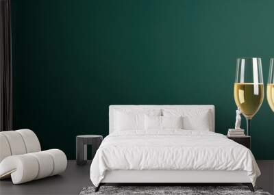 a minimalistic  sylvester green background two champagne glasses, with empty copy space,  Wall mural