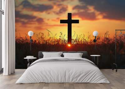 concept conceptual black cross religion symbol silhouette in grass over sunset or sunrise sky, Wall mural