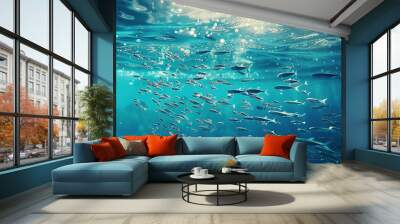 flock of young small school fish under water background ocean Wall mural