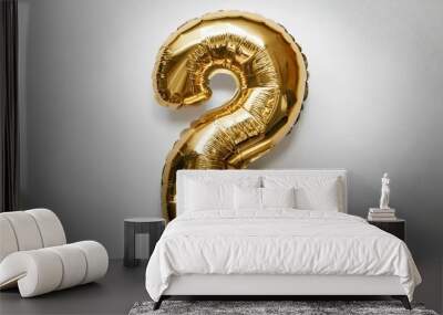 A shiny gold balloon in the shape of the number two Wall mural