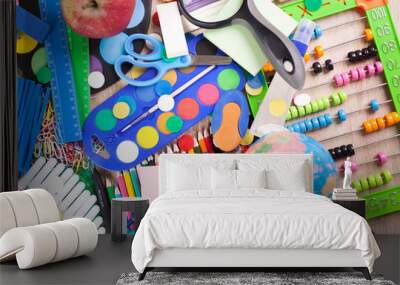 Full background of a colorful assortment of school supplies Wall mural