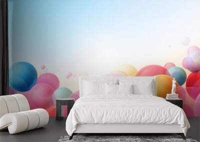 Abstract multicolored bubbles background with flying spheres or balloons, copy space. Colorful matte and glossy balls of different size on light blue background Wall mural