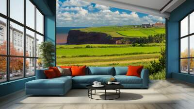 The pastoral landscape and rugged cliffs of western Prince Edward Island, Canada. Wall mural