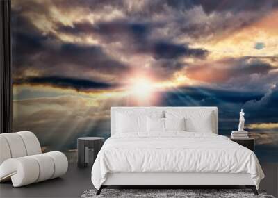 dramatic sunset sky landscape background natural color of evening cloudscape panorama with setting sun rays coming through clouds ultra wide panoramic view Wall mural