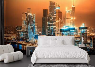 scenic moscow city russia architecture cityscape downtown landmark at night against dark orange sky background. Aerial top side view of russian capital skyline financial office district Wall mural