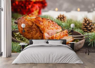 Baked Christmas pork (ham) with rosemary on Christmas table Wall mural