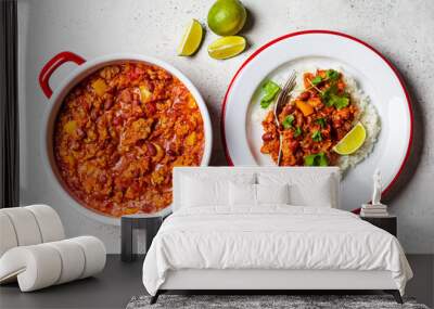 Chili con carne - minced meat with vegetables and beans in tomato sauce with rice in bowl. Mexican food concept. Wall mural