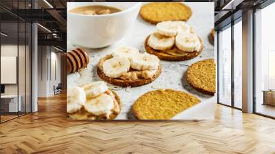 Crispbread with peanut butter, banana and honey. Vegan food concept. Wall mural