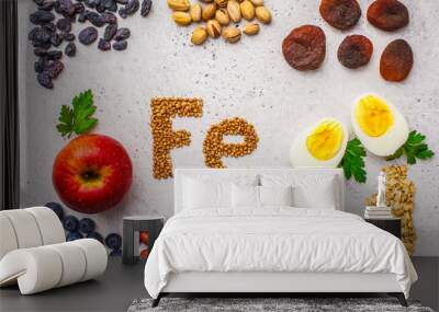 Healthy product sources of iron. Top view, food background, Fe ingredients on a white background. Wall mural