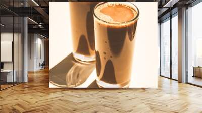 Iced coffee with milk cocktail on white table. Wall mural