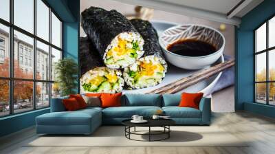 Vegan nori wraps with rice, hummus, vegetables and seedlings. Wall mural